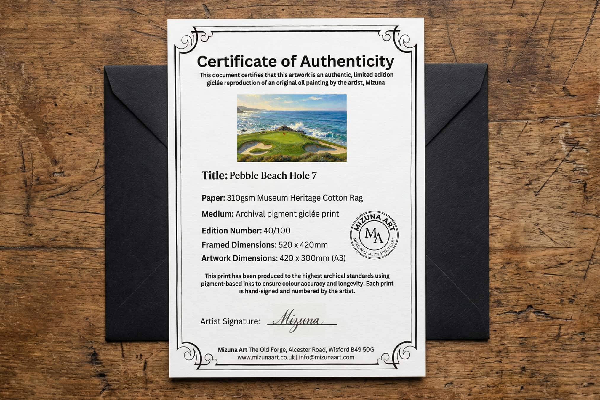 Pebble Beach Hole 7 certificate of authenticity laid over its black presentation envelope